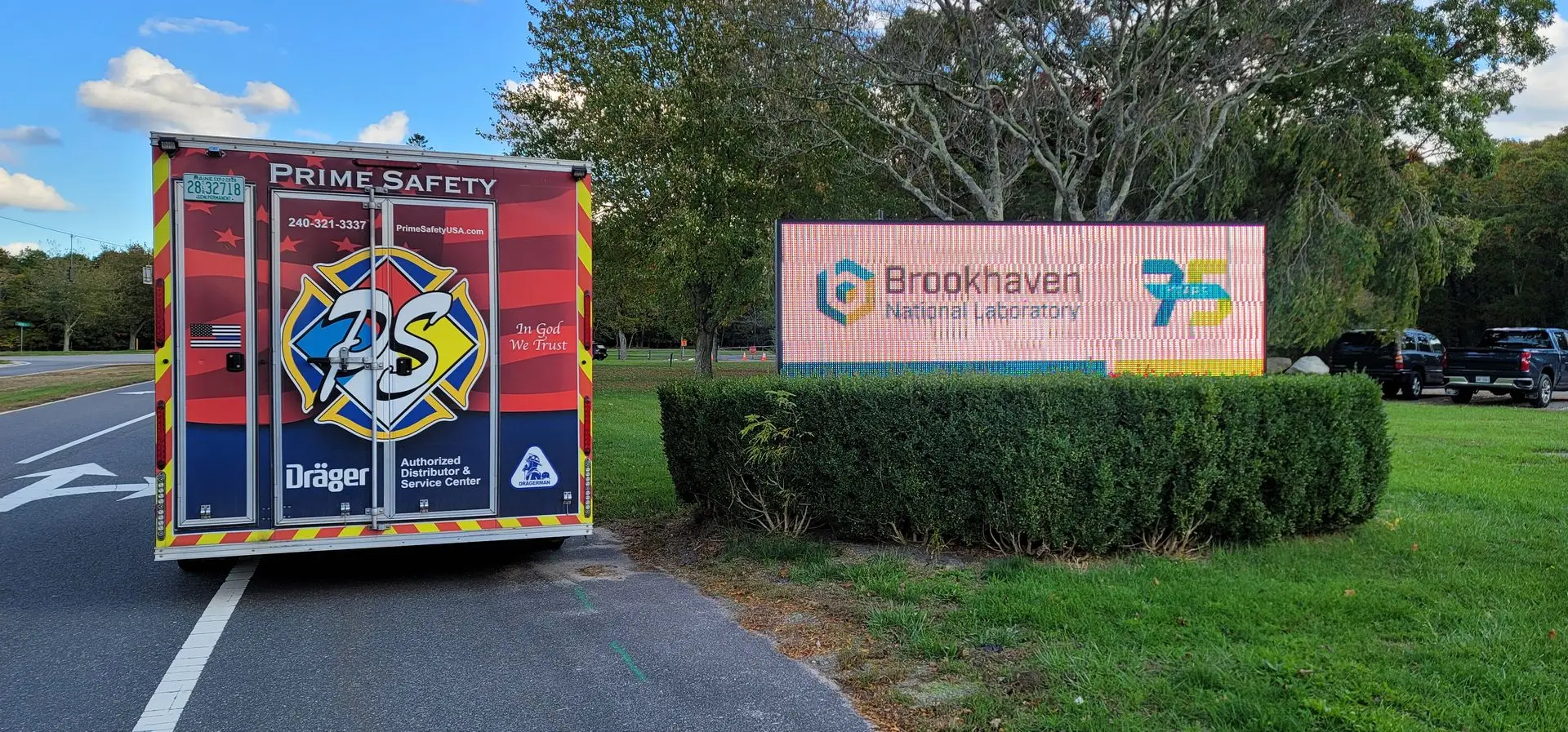 Prime Safety service trailer next to Brookhaven National Laboratory Sign after a completed service